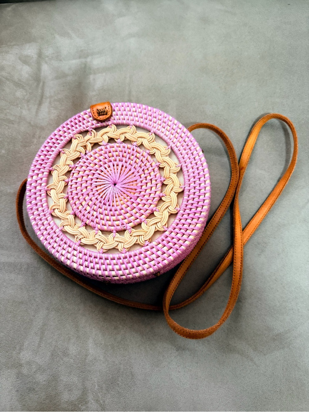 Round Pink Woven Crossbody Bag with Tan Strap